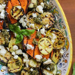 THE ROASTED ROOT GRILLED SWEET POTATOES, ZUCCHINI, AND YELLOW SQUASH WITH PESTO AND FETA