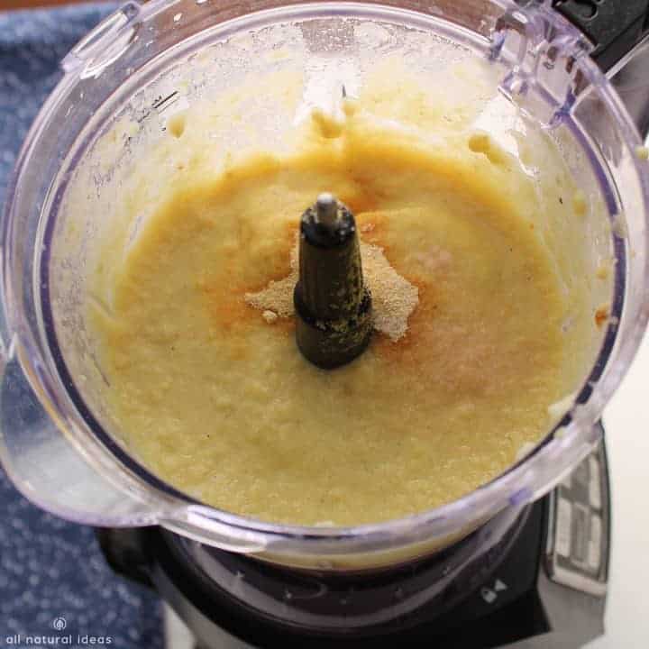Blending the paleo nutritional yeast vegan cheese sauce in blender