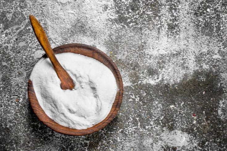 baking soda in bowl with spoon